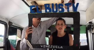 To fight state media censorship in Venezuela, journalists are using cardboard television screens to present news reports on city buses. (Kejal Vyas/Wall Street Journal)